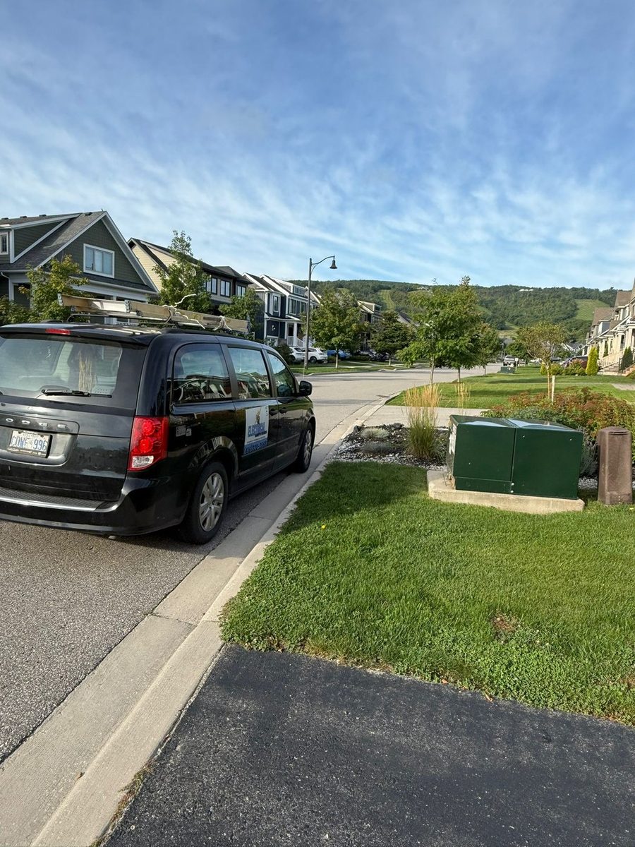 AM Services Inc. van on a job in Simcoe County